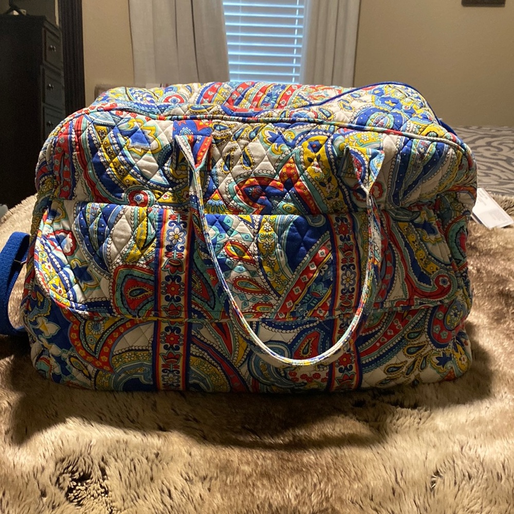 9 pieces of Vera Bradley travel bags paisley print, red, yellow, blue white aqua